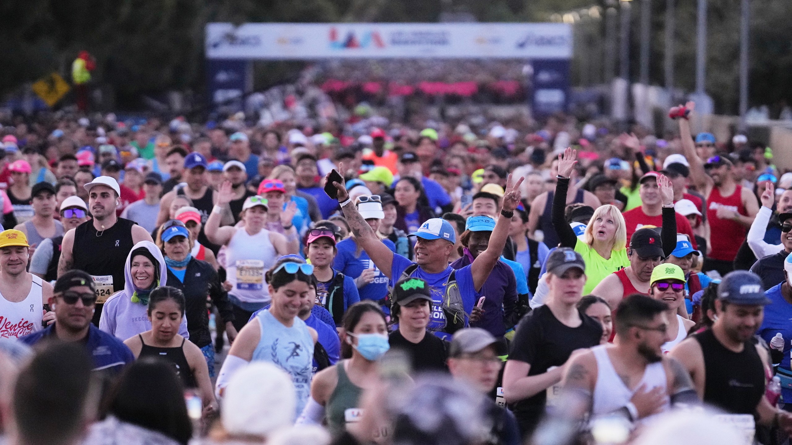 Participants prepare for the start of the Los Angeles Marathon Sunday, March 16, 2025, in Los Angeles. (AP Photo/Eric Thayer)