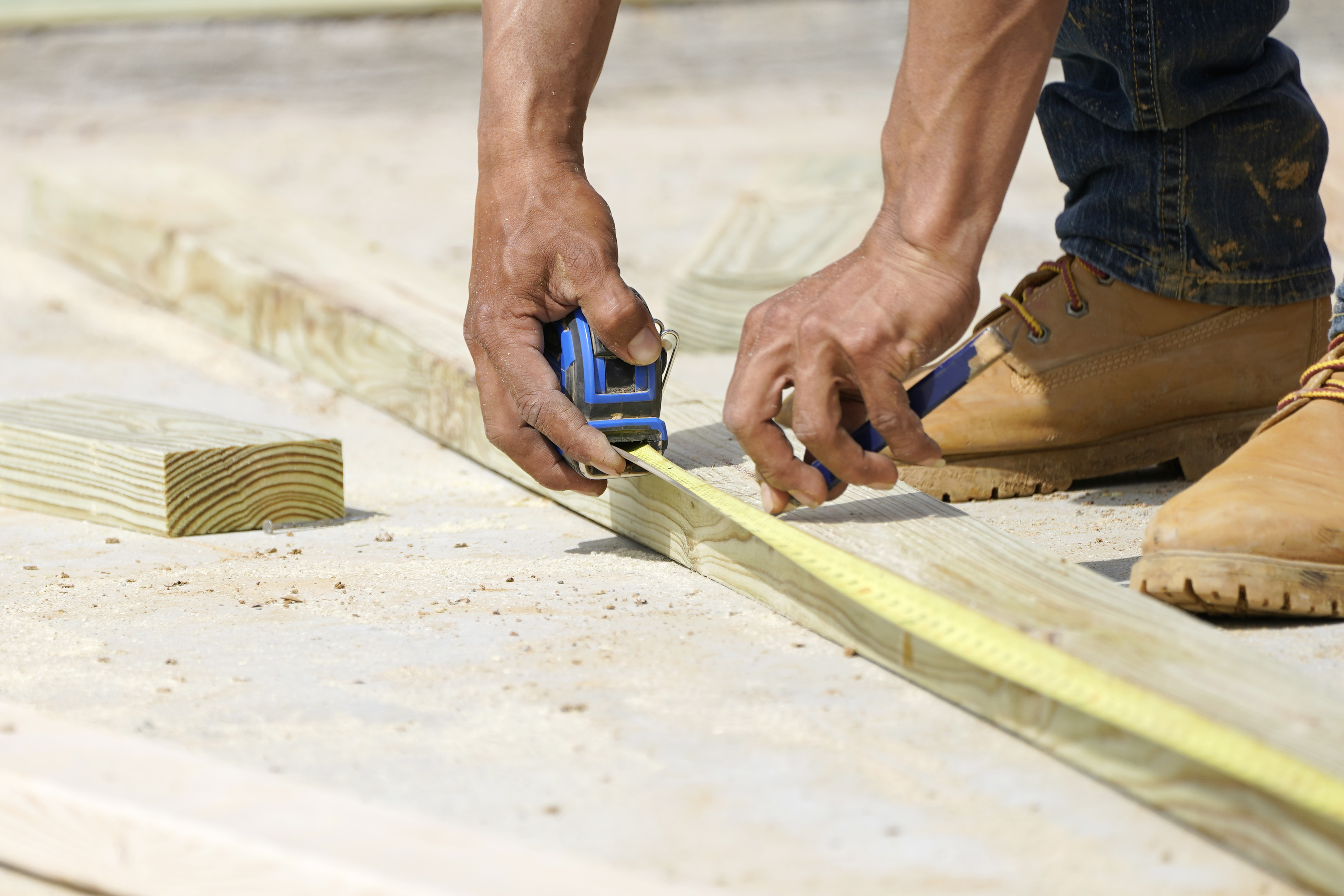 FILE - A beam is measured and marked at a housing site in Madison County, Miss., Tuesday, March 16, 2021. (AP Photo/Rogelio V. Solis, File)