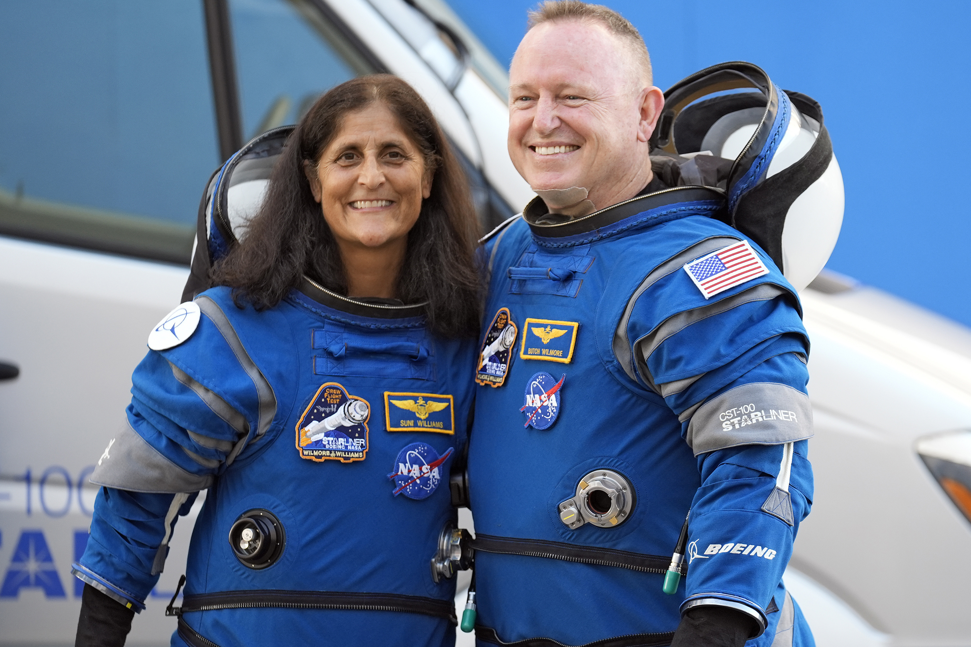 FILE - NASA astronauts Suni Williams, left, and Butch Wilmore stand together for a photo enroute to the launch pad at Space Launch Complex 41 Wednesday, June 5, 2024, in Cape Canaveral, Fla., for their liftoff on a Boeing Starliner capsule to the International Space Station. (AP Photo/Chris O'Meara, File)