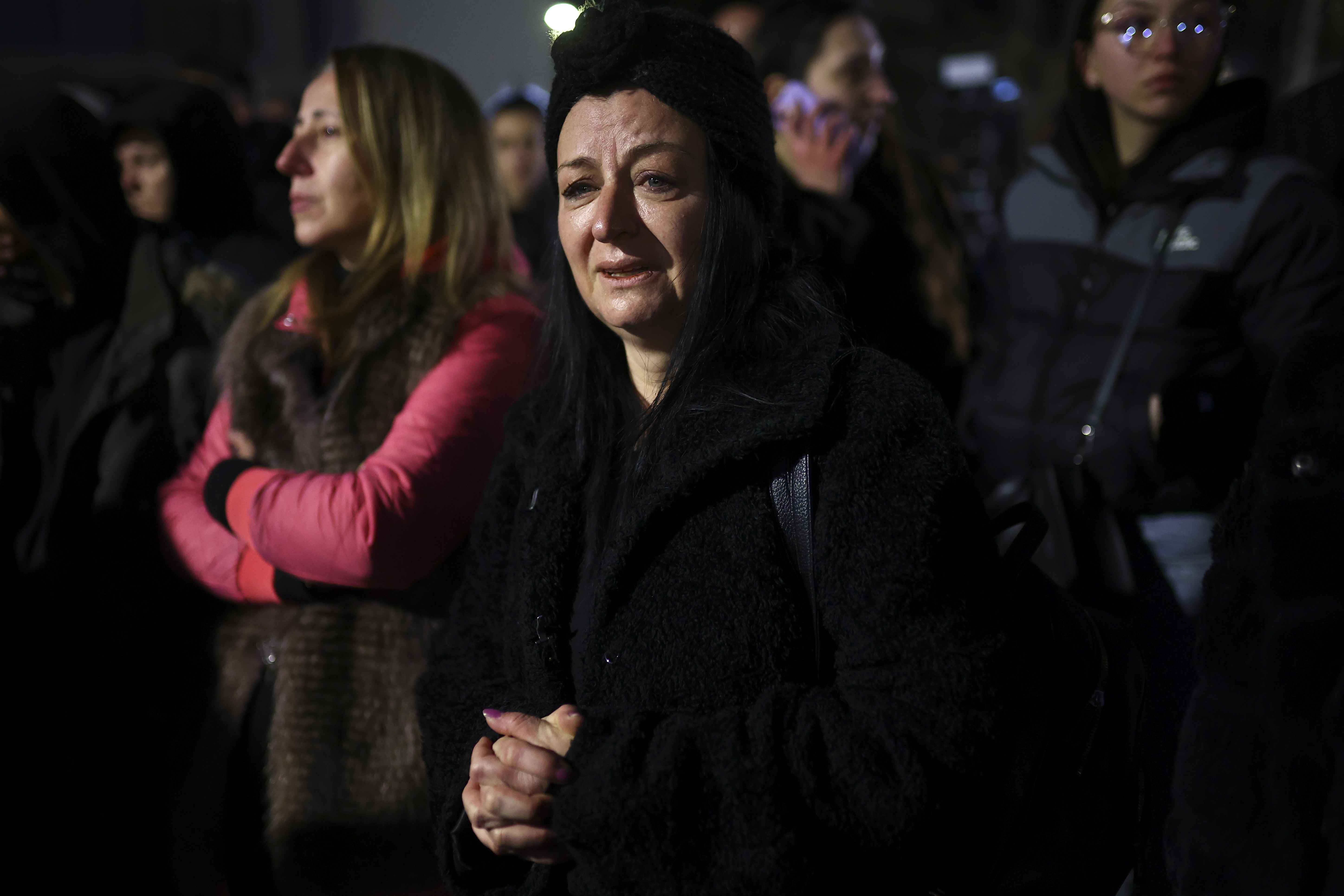 People take part in a protest in the town of Kocani, North Macedonia, Tuesday, March 18, 2025 following a massive fire in a nightclub early SUnday. (AP Photo/Armin Durgut)