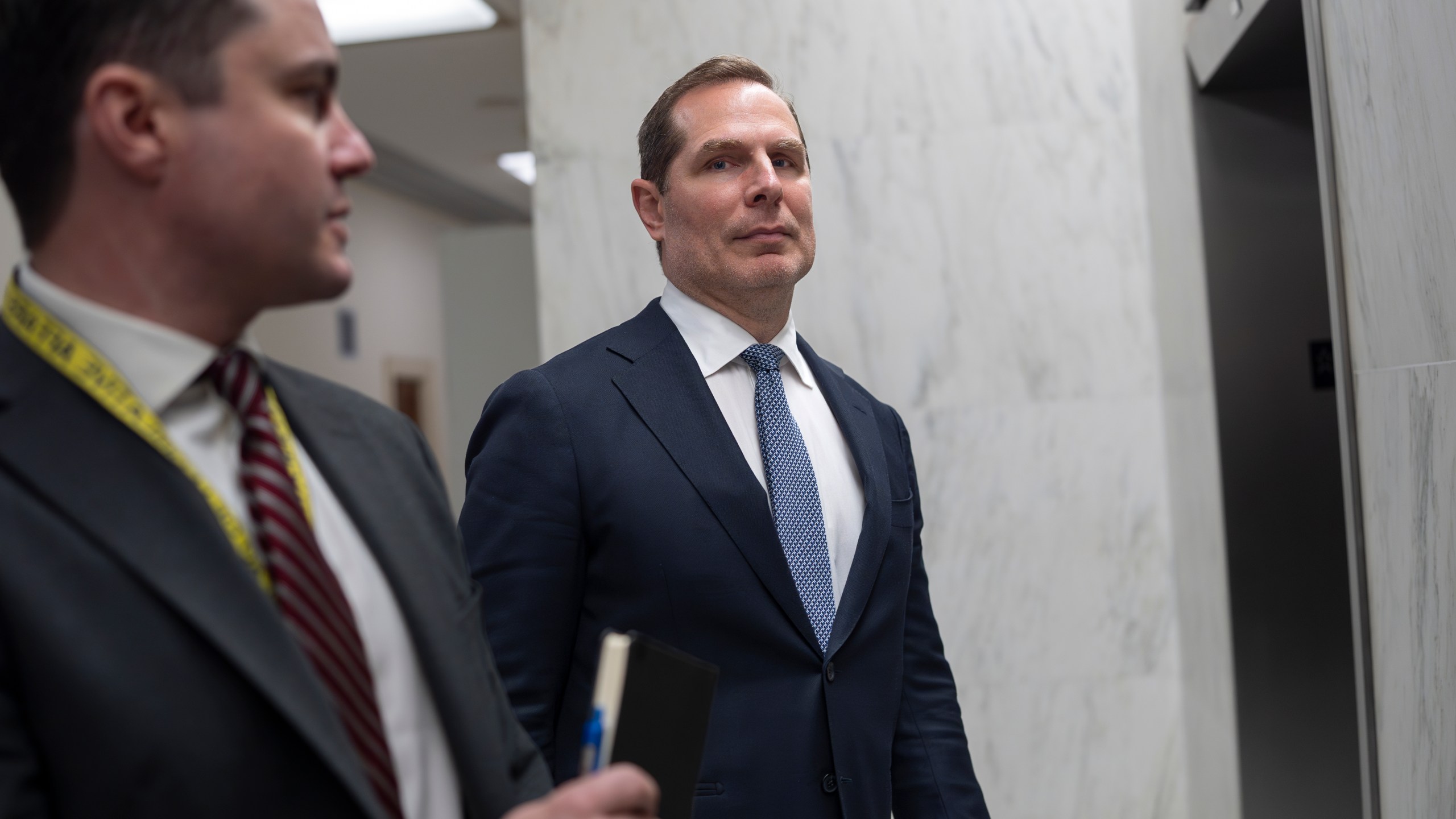 Pete Marocco, a political appointee focused on gutting USAID, departs after briefing the House Foreign Affairs Committee behind closed doors, on Capitol Hill in Washington, Wednesday, March 5, 2025. (AP Photo/J. Scott Applewhite)