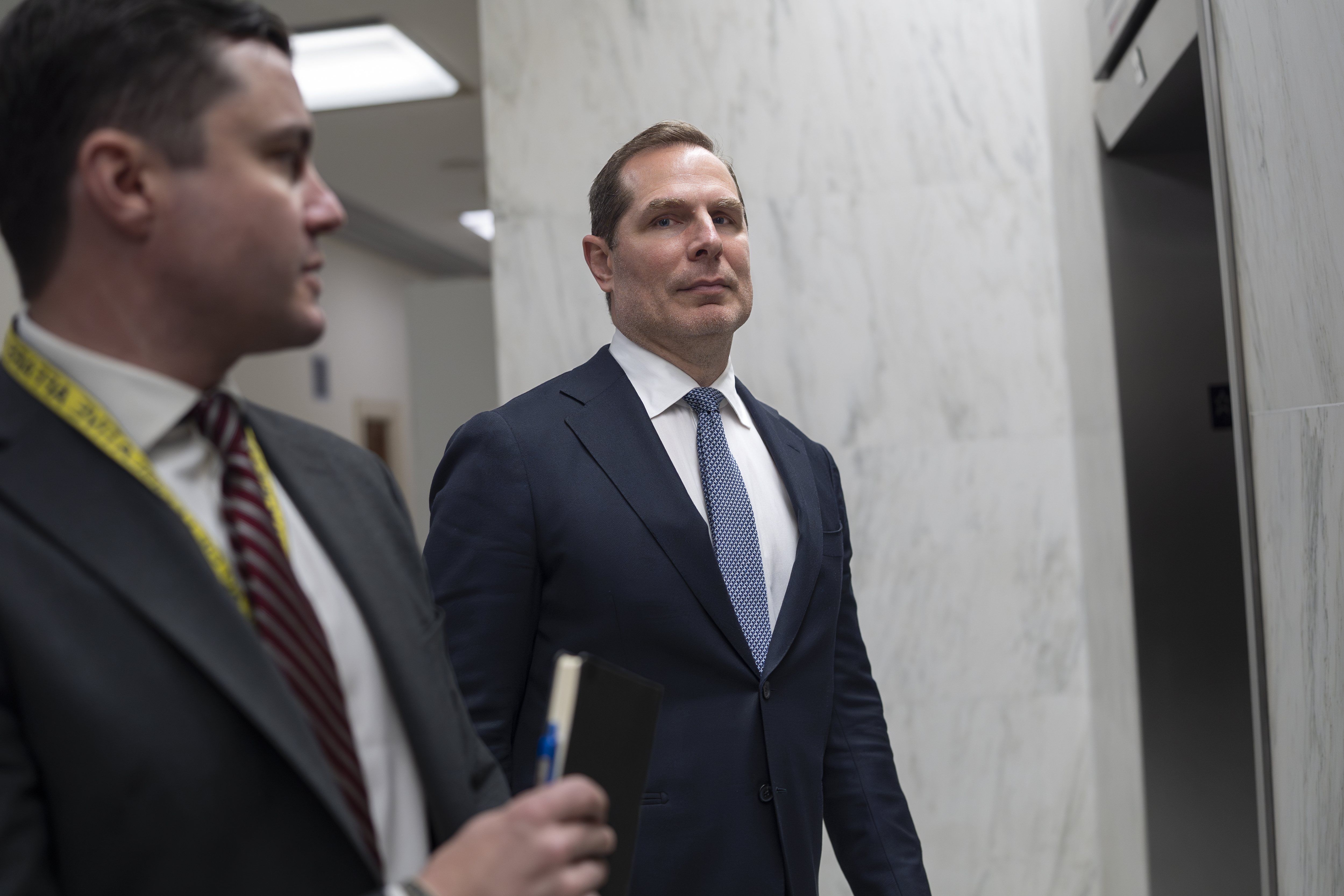 Pete Marocco, a political appointee focused on gutting USAID, departs after briefing the House Foreign Affairs Committee behind closed doors, on Capitol Hill in Washington, Wednesday, March 5, 2025. (AP Photo/J. Scott Applewhite)