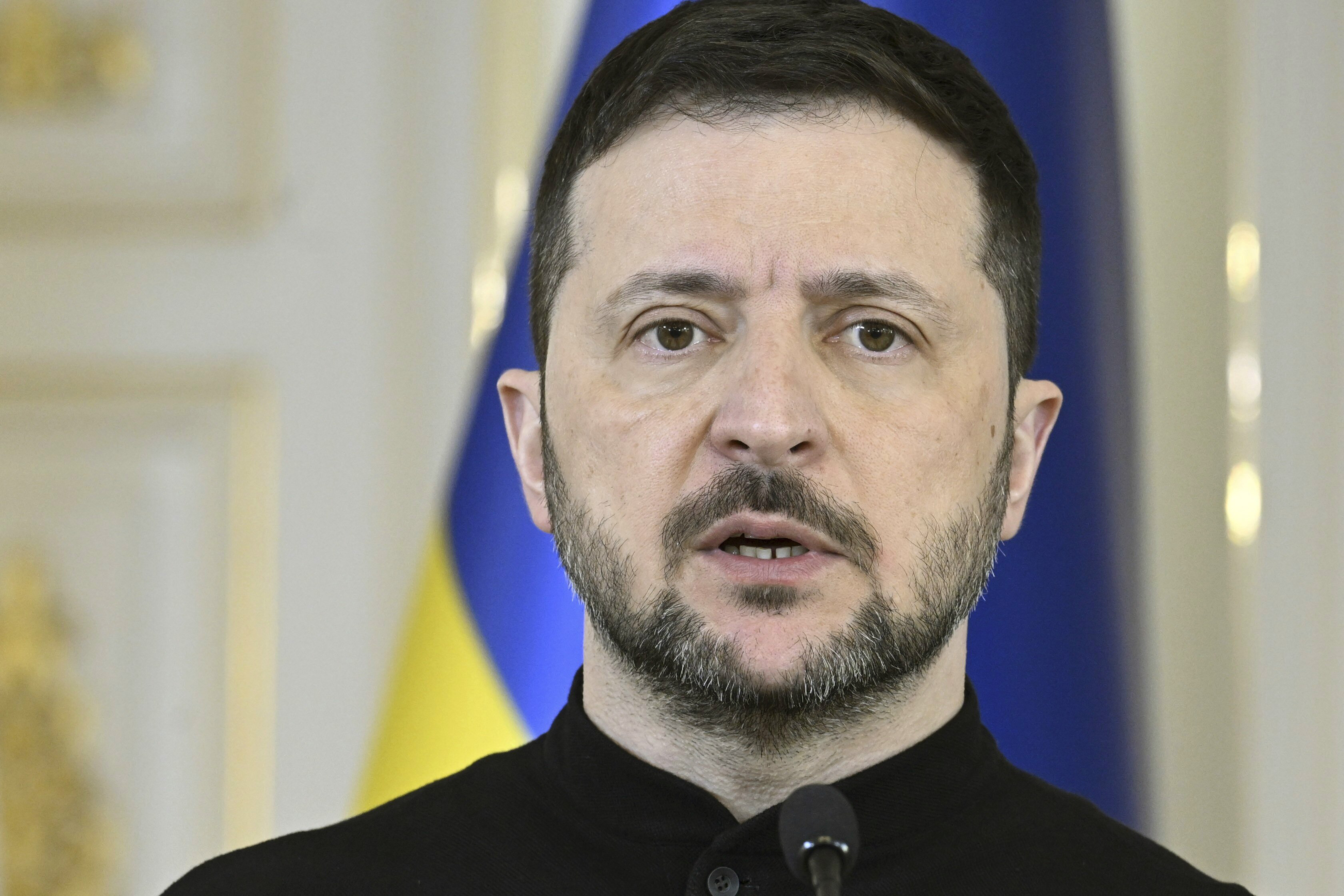 Ukrainian President Volodymyr Zelenskyy speaks, during a joint press conference with Finland's President Alexander Stubb, at the Presidential Palace, in Helsinki, Finland, Wednesday, March 19, 2025. (Heikki Saukkomaa/Lehtikuva via AP)