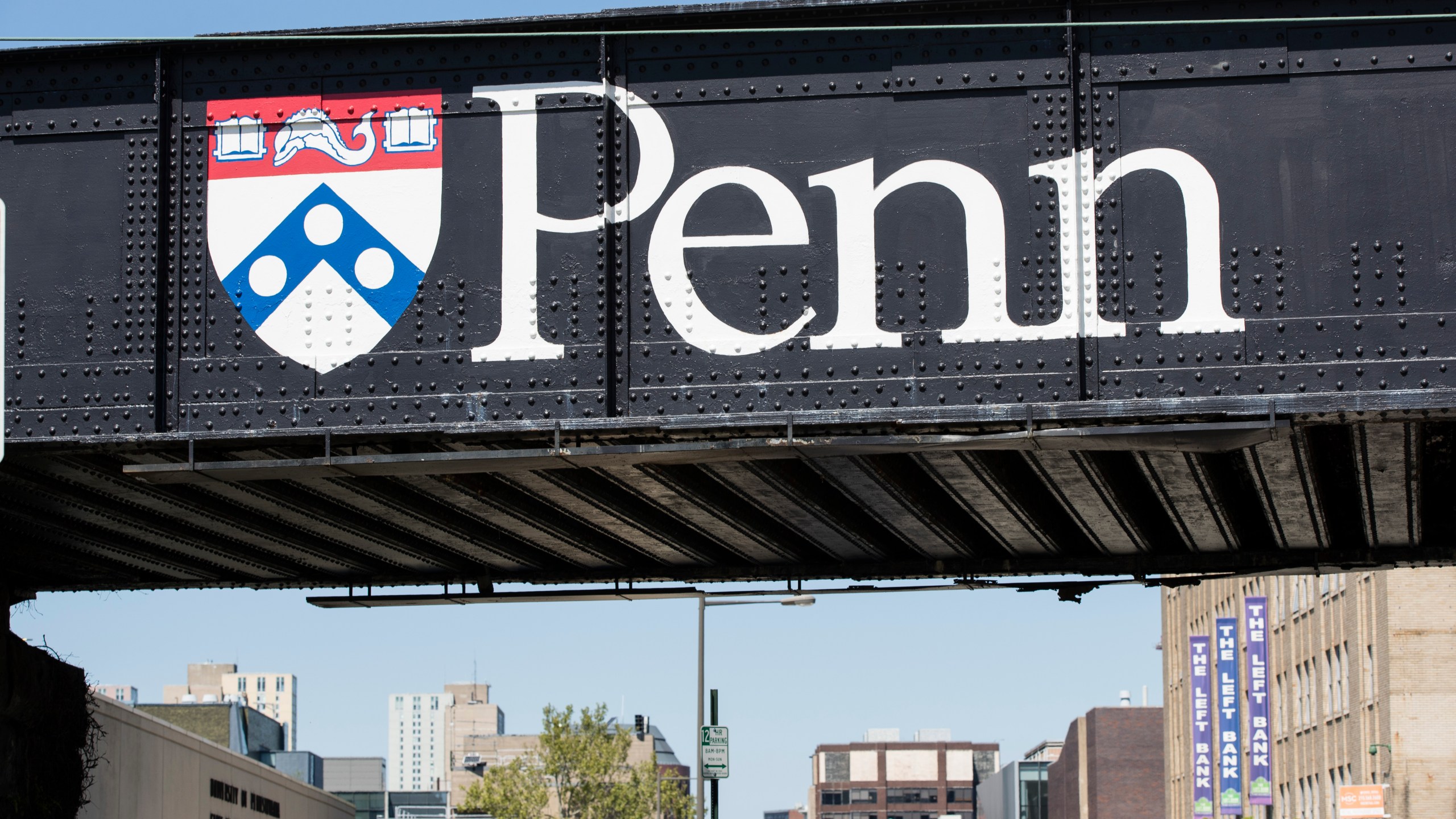 FILE - University of Pennsylvania signage is seen in Philadelphia Wednesday, May 15, 2019. (AP Photo/Matt Rourke, File)