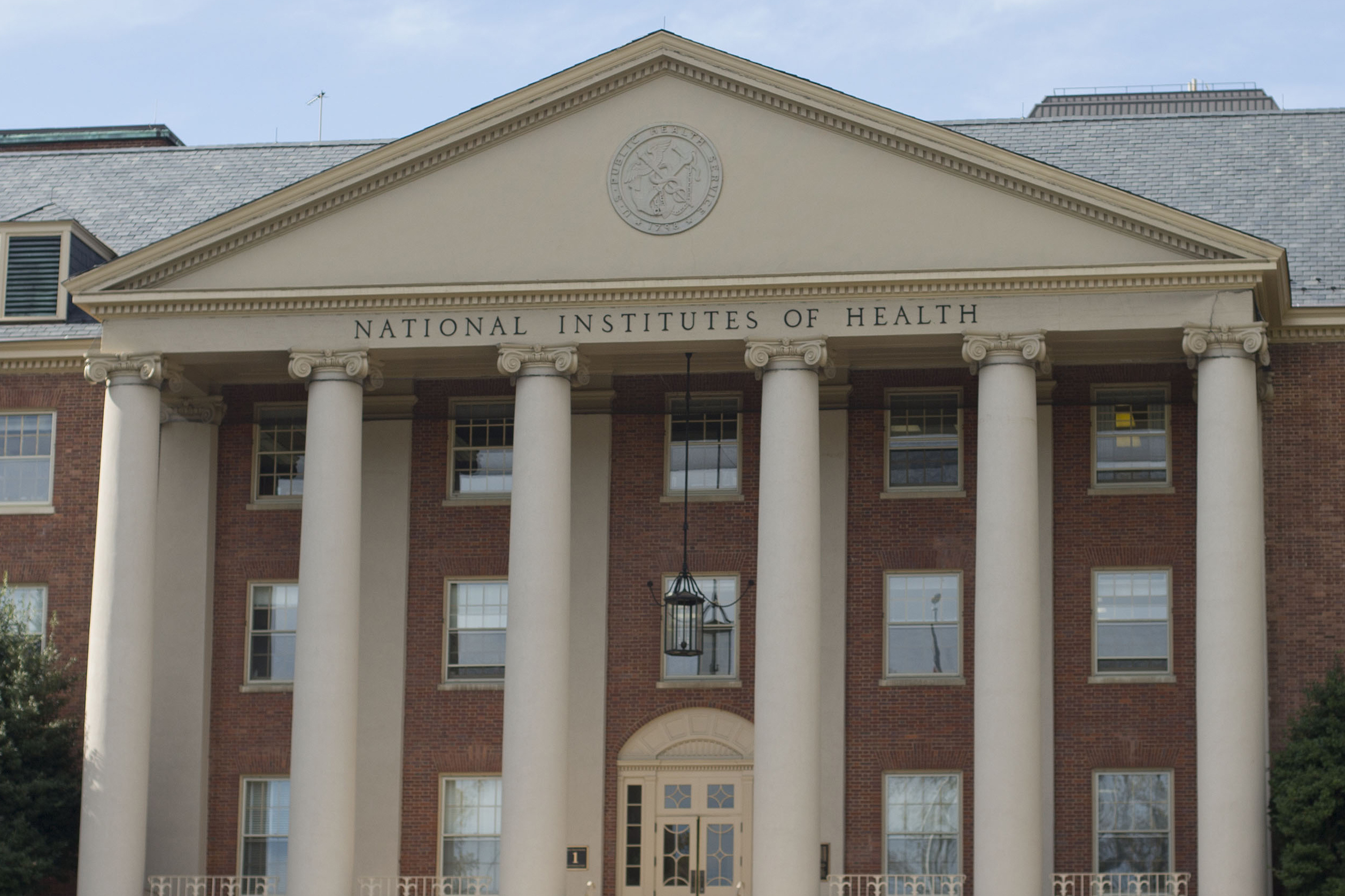 FILE - The National Institutes of Health's James Shannon building is seen on the agency's campus in Bethesda, Md., Friday, Oct. 24, 2014. (AP Photo/Pablo Martinez Monsivais, File)