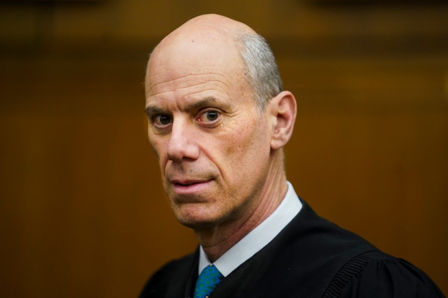 FILE - U.S. District Judge James Boasberg, chief judge of the United States District Court for the District of Columbia, stands for a portrait at E. Barrett Prettyman Federal Courthouse in Washington, March 16, 2023. (Carolyn Van Houten/The Washington Post via AP, File)