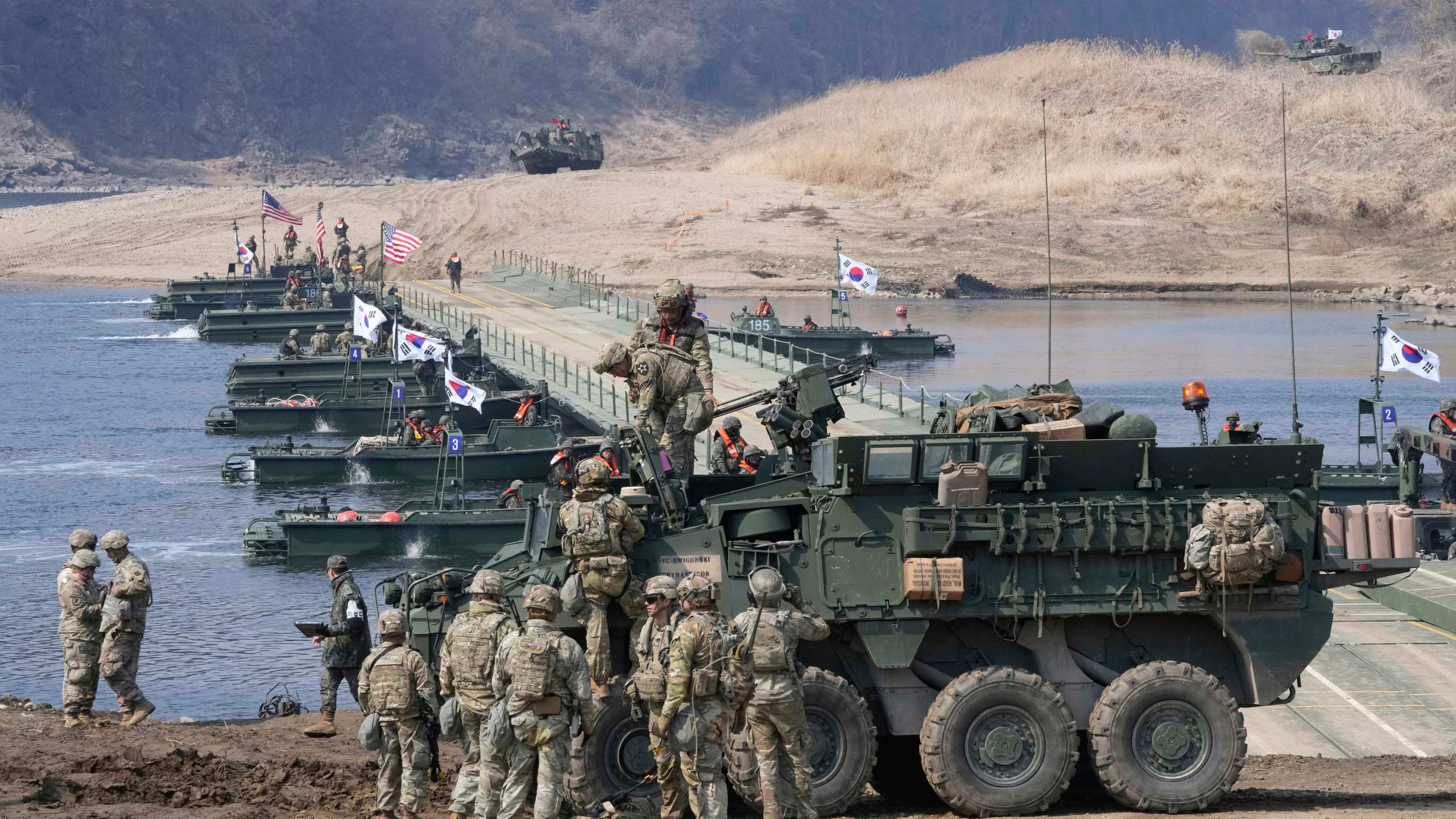 U.S. Army soldiers participate in a joint river-crossing exercise between South Korea and the United States as a part of the Freedom Shield military exercise in Yeoncheon, South Korea, Thursday, March 20, 2025. (AP Photo/Ahn Young-joon)