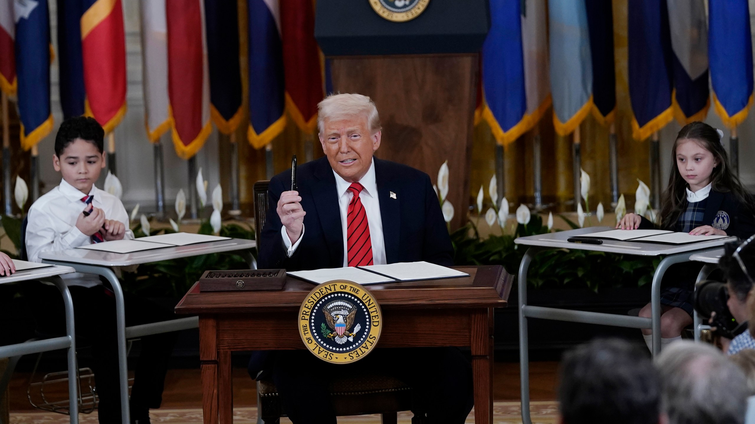 President Donald Trump speaks at an education event and executive order signing in the East Room of the White House in Washington, Thursday, March 20, 2025.(AP Photo/Jose Luis Magana)