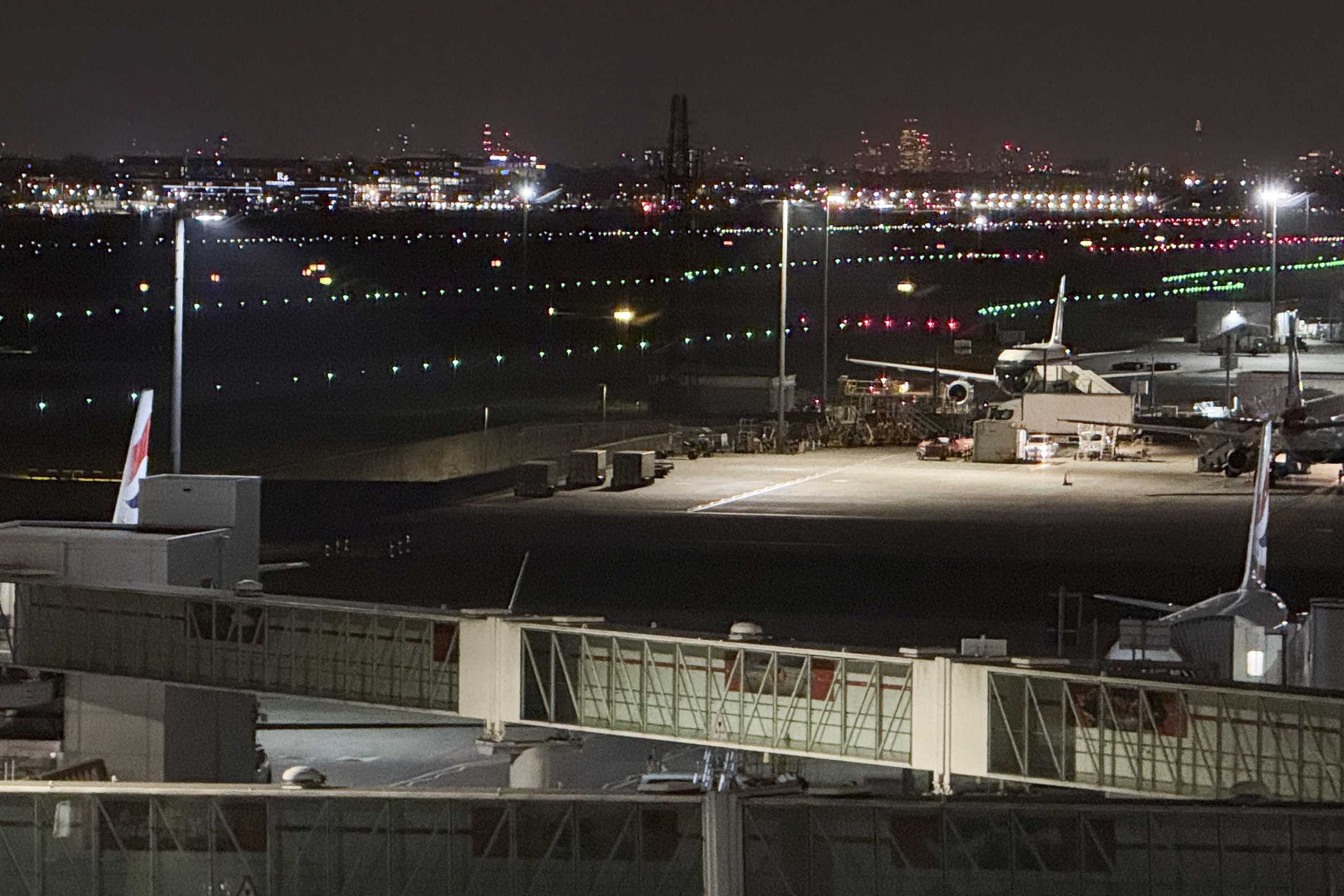 The runway at Heathrow Airport is lit again after a fire at an electrical substation shuttered Europe's busiest air travel hub in London, Friday, March 21, 2025.(AP Photo/Alberto Pezzali)