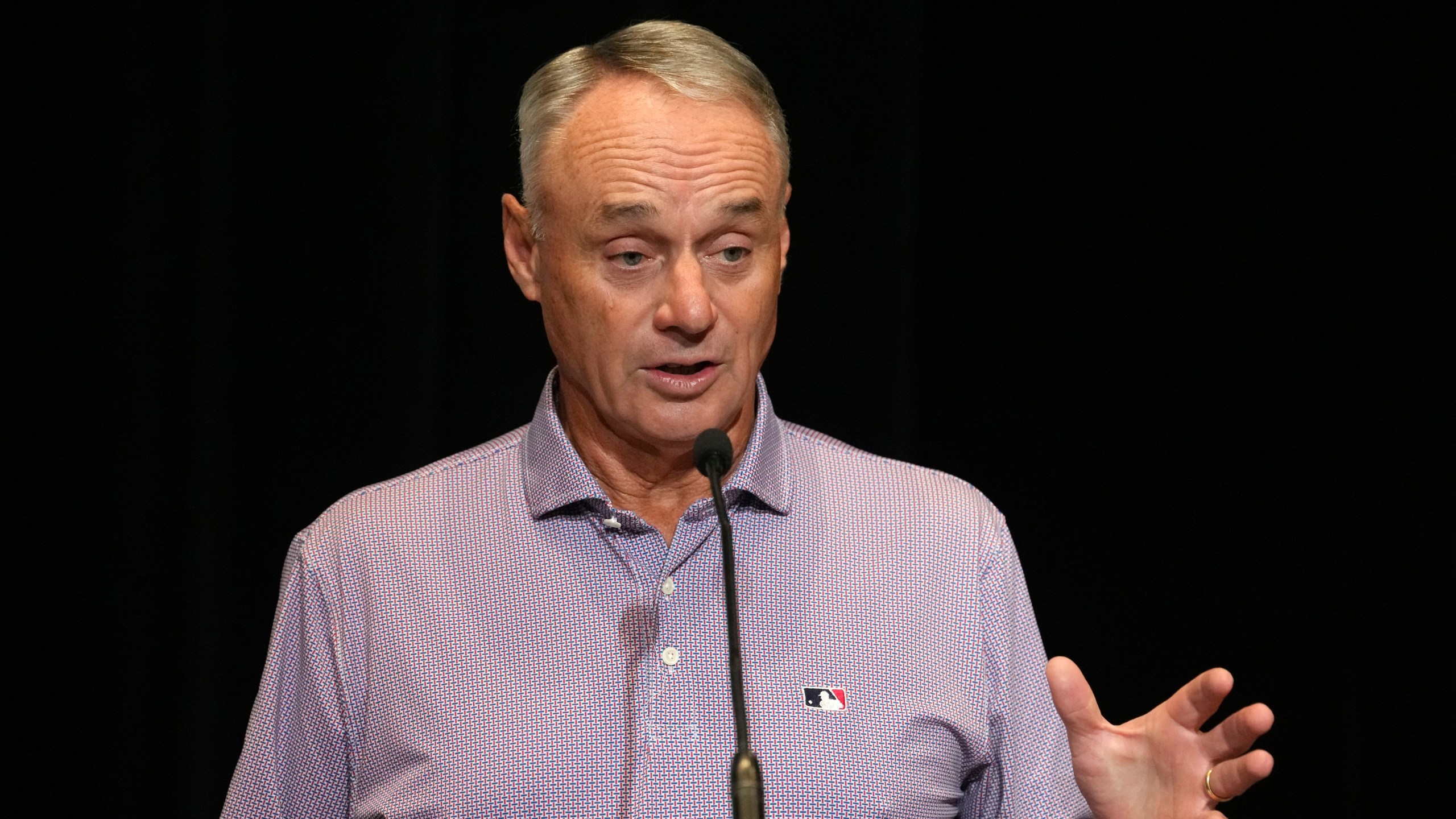 FILE - MLB Commissioner Rob Manfred speaks during a news conference Tuesday, Feb. 18, 2025, in Phoenix. (AP Photo/Ross D. Franklin, File)