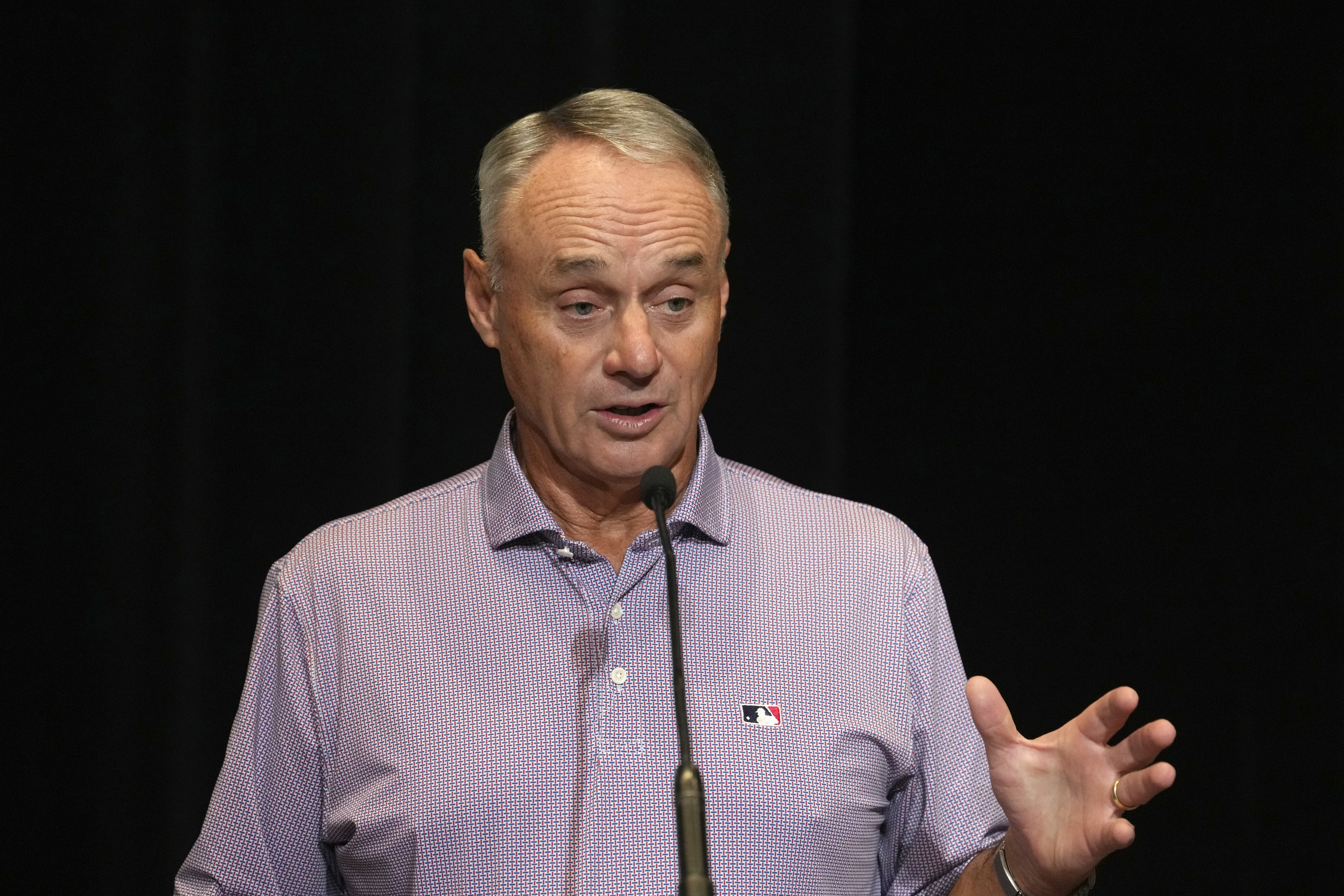 FILE - MLB Commissioner Rob Manfred speaks during a news conference Tuesday, Feb. 18, 2025, in Phoenix. (AP Photo/Ross D. Franklin, File)