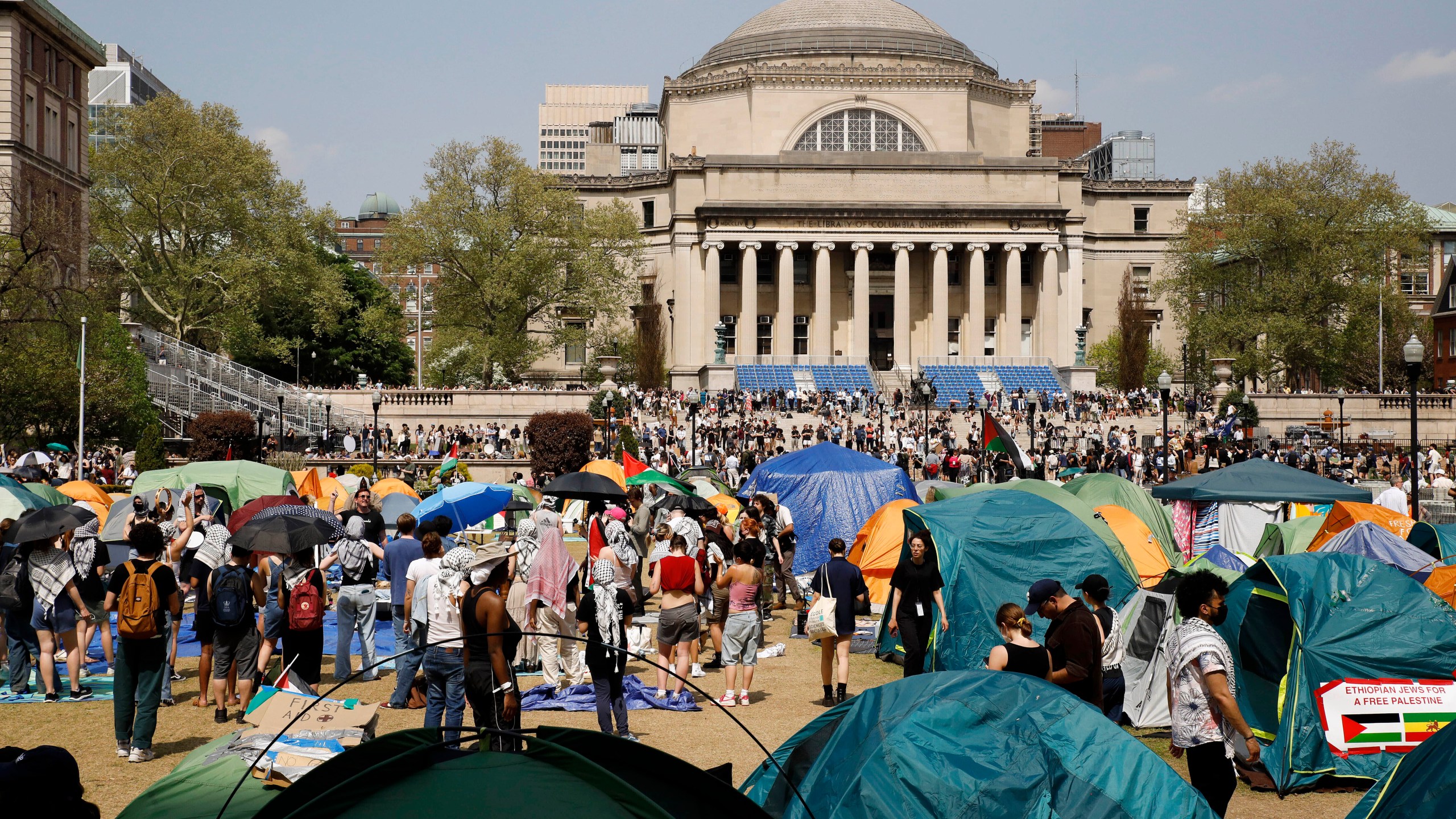 FILE - Student protesters gather inside their encampment on the Columbia University campus, April 29, 2024, in New York. (AP Photo/Stefan Jeremiah, File)