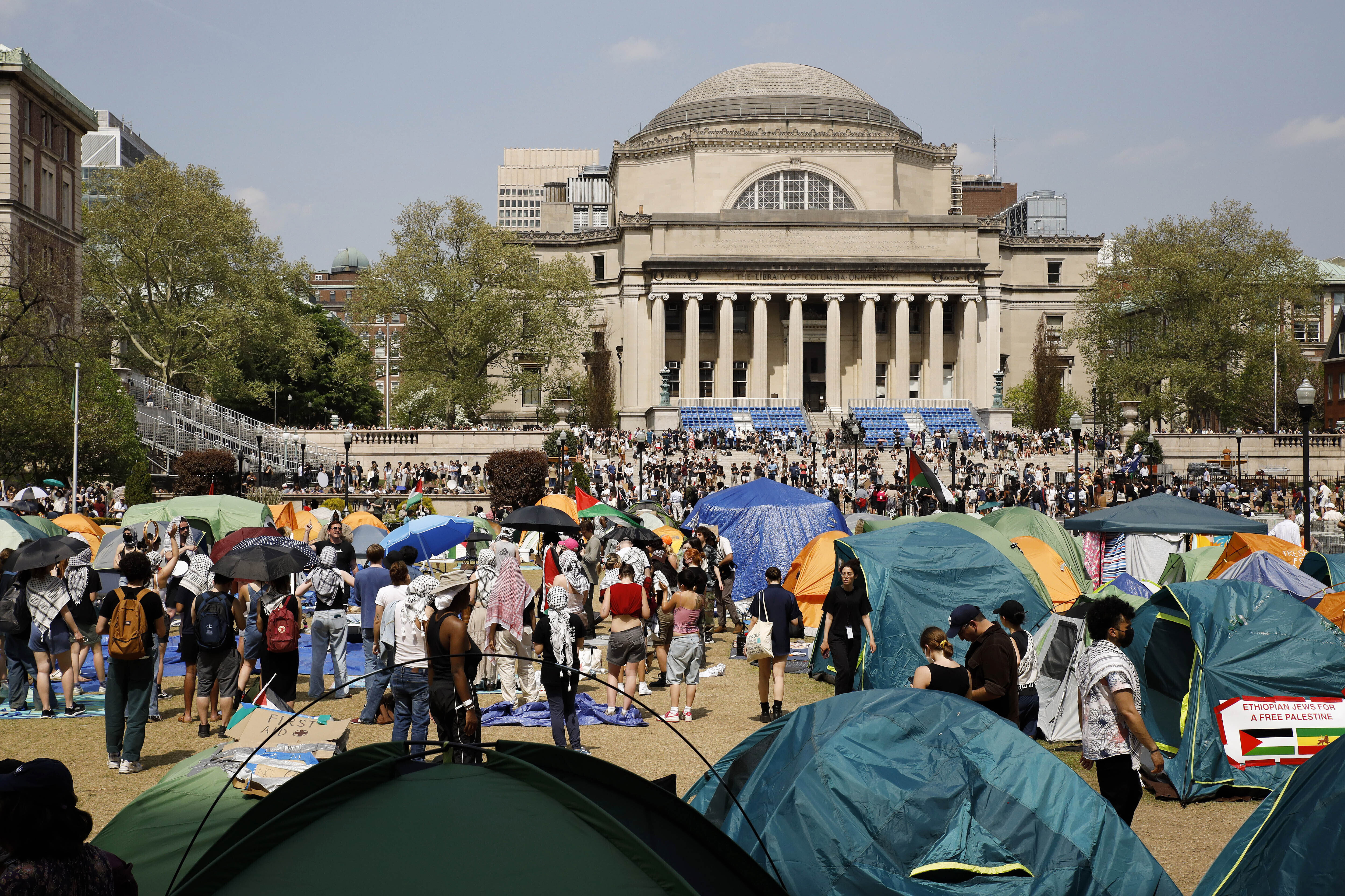 FILE - Student protesters gather inside their encampment on the Columbia University campus, April 29, 2024, in New York. (AP Photo/Stefan Jeremiah, File)