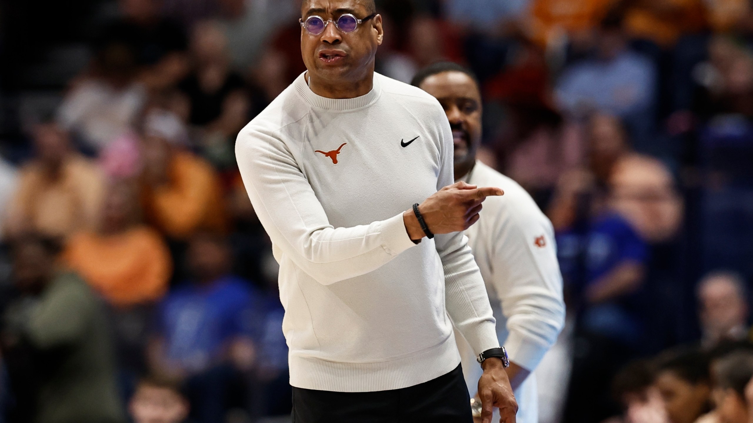 Texas head coach Rodney Terry speaks during the first half of an NCAA college basketball game against the Tennessee in the quarterfinal round of the Southeastern Conference tournament, Friday, March 14, 2025, in Nashville, Tenn. (AP Photo/Wade Payne)