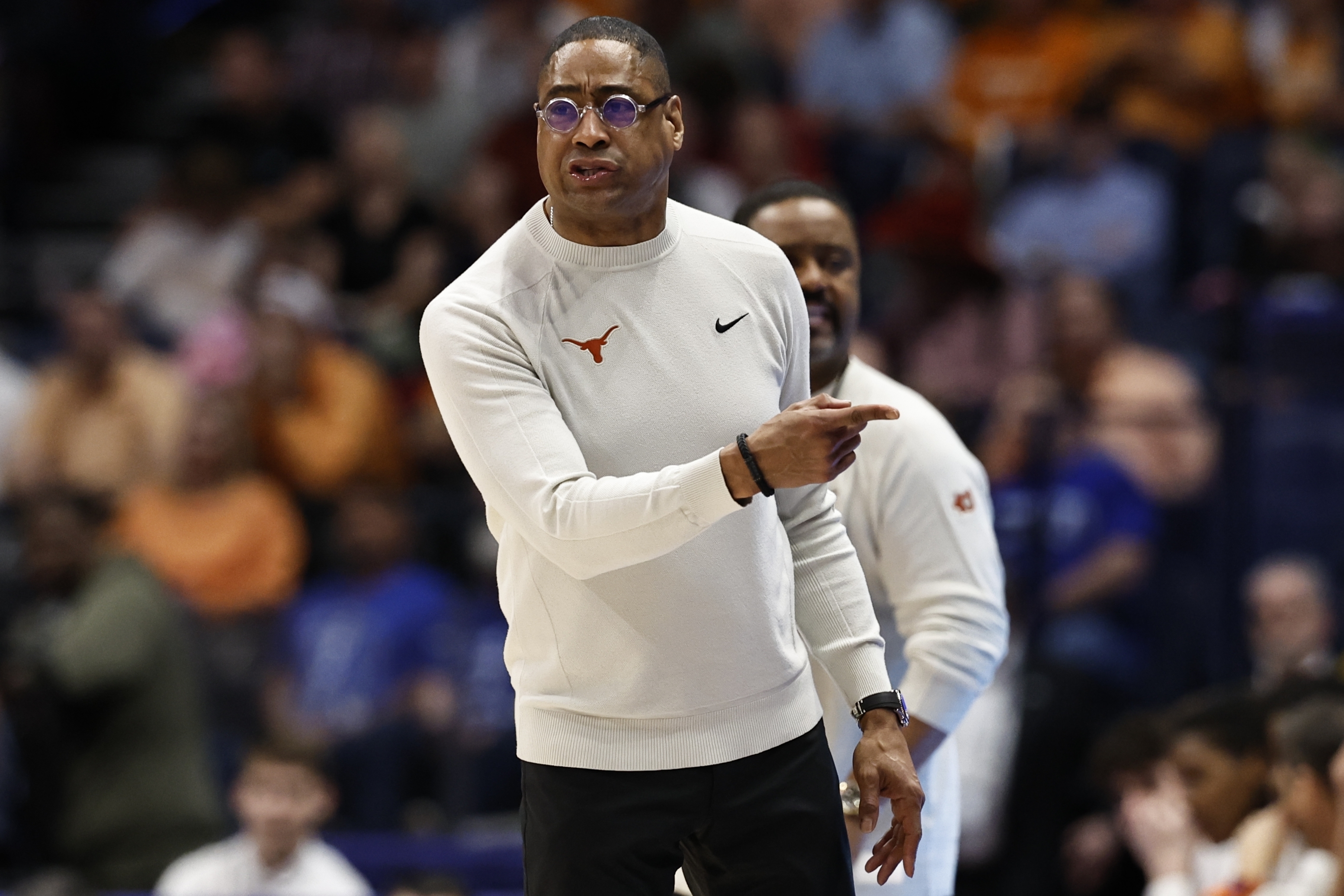 Texas head coach Rodney Terry speaks during the first half of an NCAA college basketball game against the Tennessee in the quarterfinal round of the Southeastern Conference tournament, Friday, March 14, 2025, in Nashville, Tenn. (AP Photo/Wade Payne)