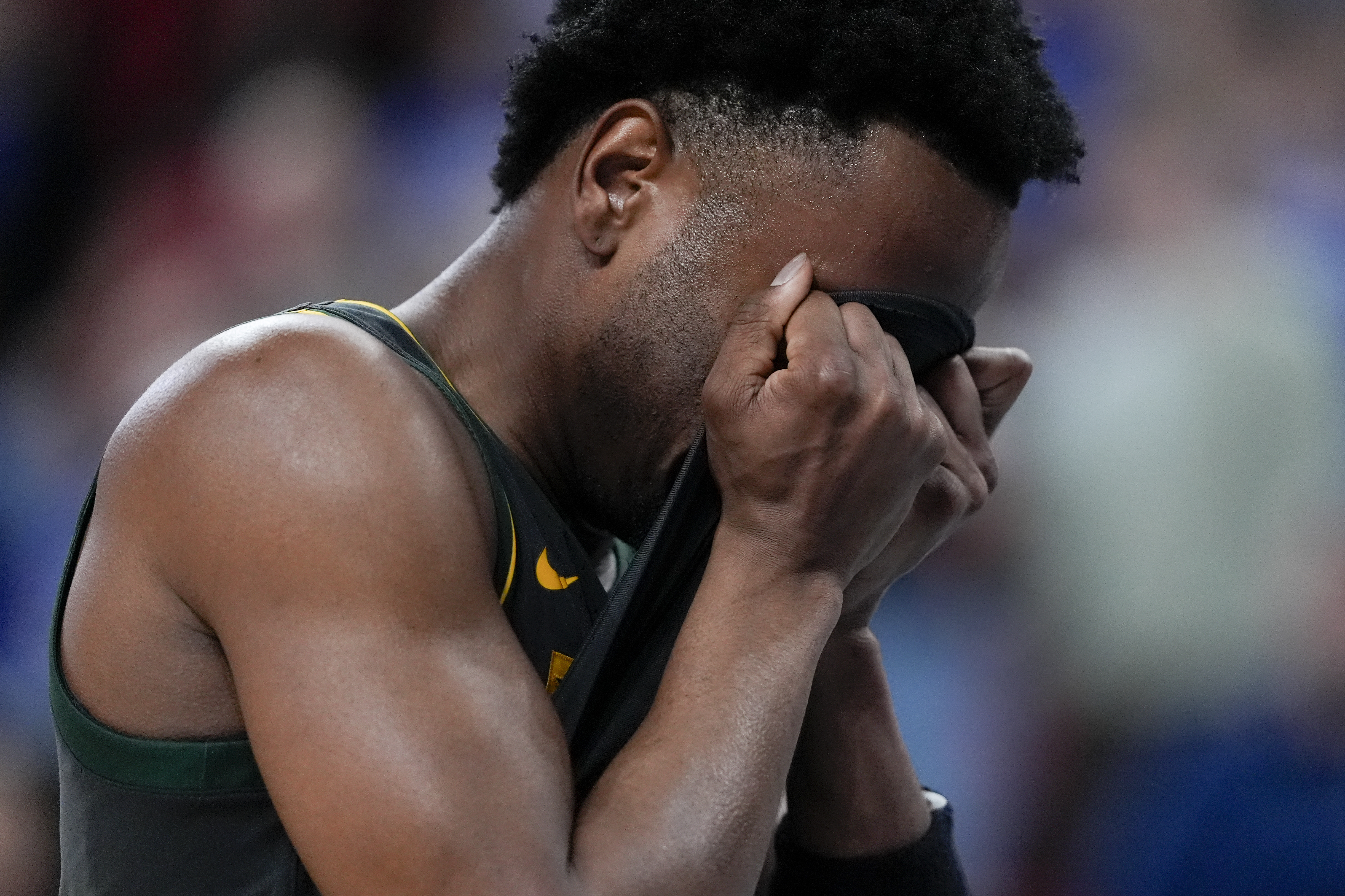 Baylor guard Jeremy Roach reacts to their loss against Duke in the second round of the NCAA college basketball tournament, Sunday, March 23, 2025, in Raleigh, N.C. (AP Photo/Chris Carlson)