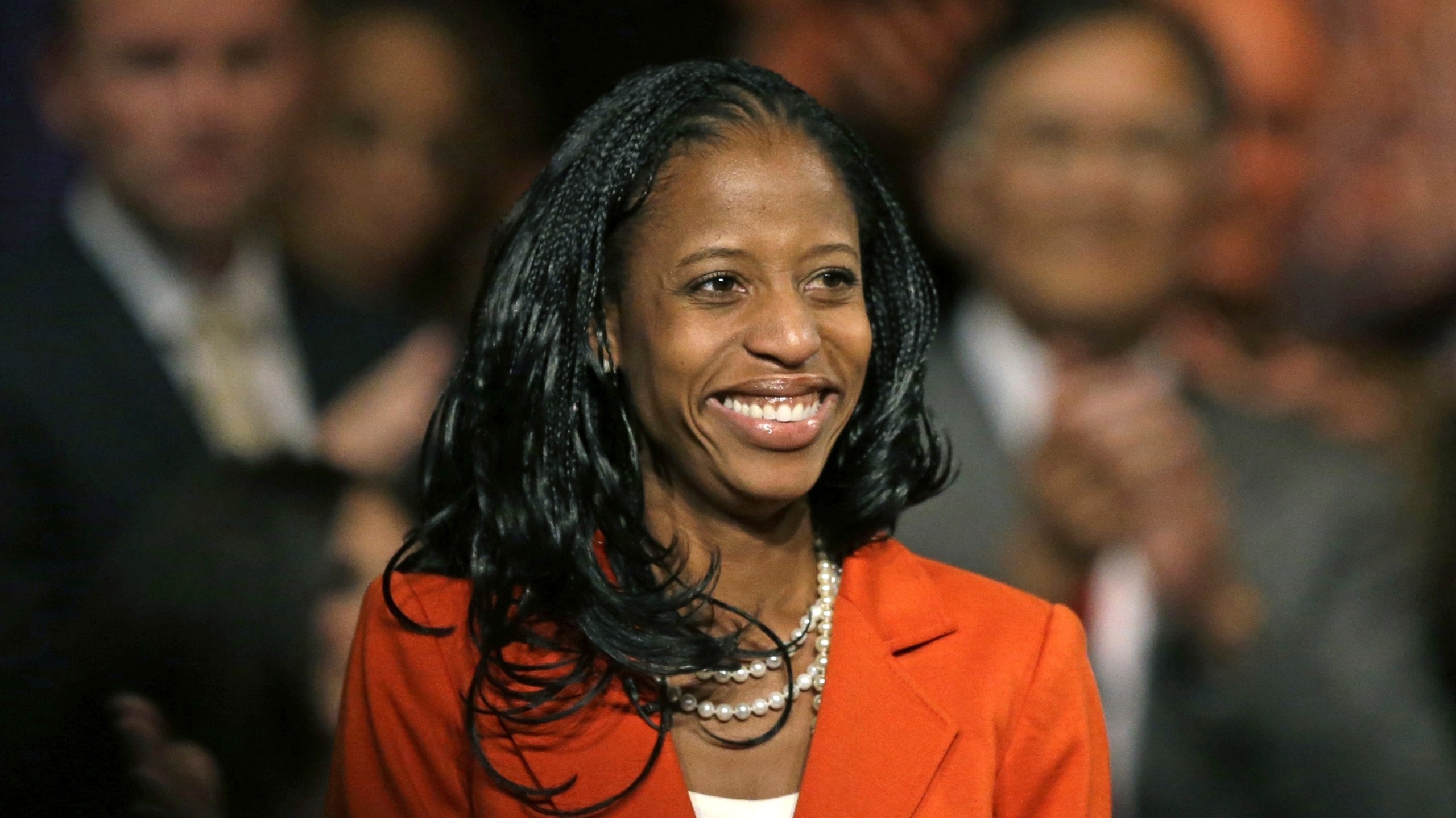 FILE - Mia Love, the Republican nominee in Utah's 4th congressional district, smiles after speaking during a rally in Lehi, Utah, Oct. 8, 2014. (AP Photo/Rick Bowmer, File)