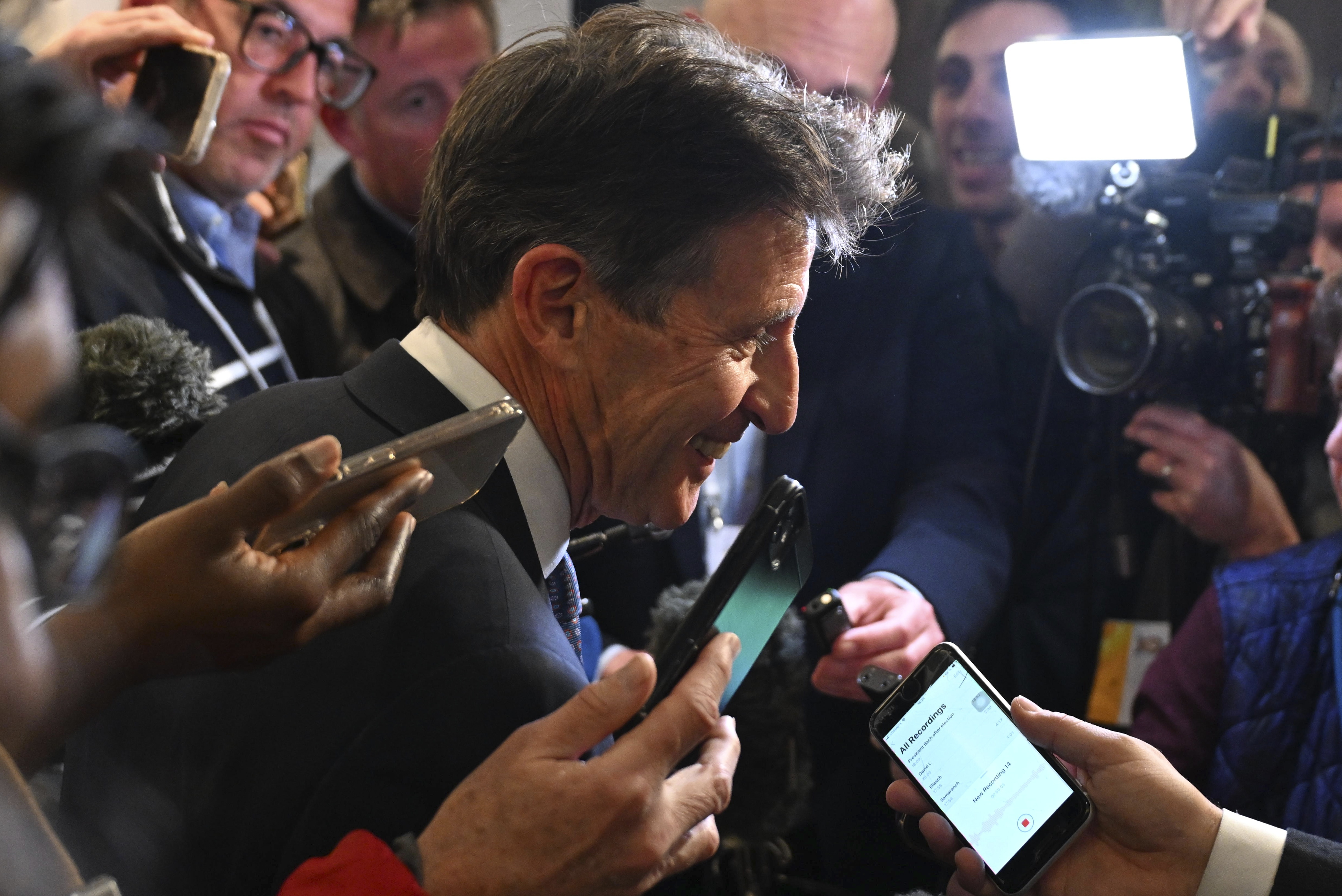 Unsuccessful candidate Sebastian Coe speaks to the media after he failed in his bid to become the new IOC President at the International Olympic Committee 144th session in Costa Navarino, western Greece, Thursday, March 20, 2025. (AP Photo/Nikolas Kominis)